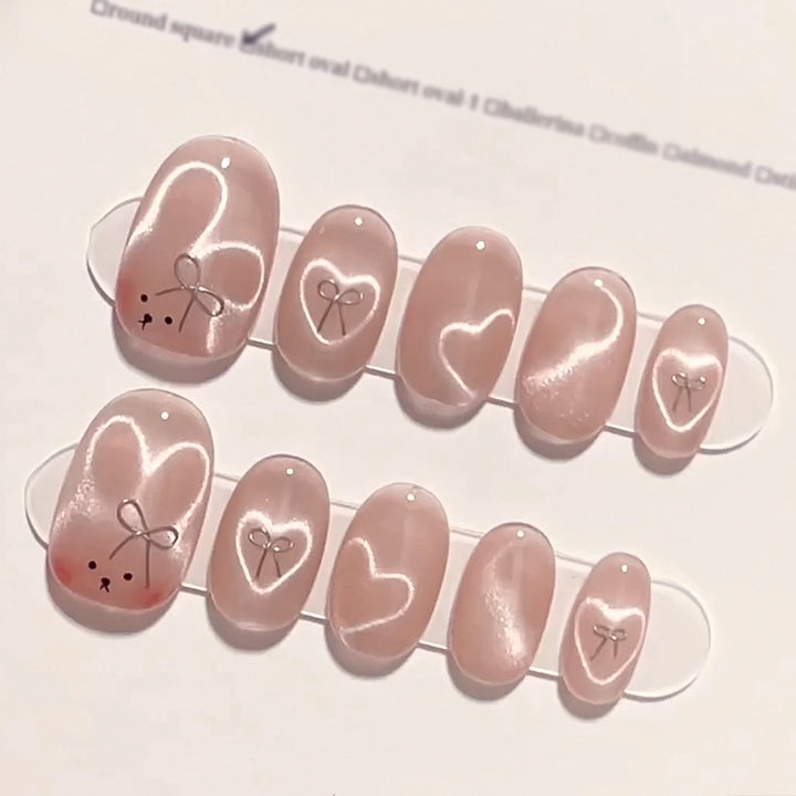 Künstliche Nagelverlängerungen mit niedlichem Hasen-Design und Herzen Karnz