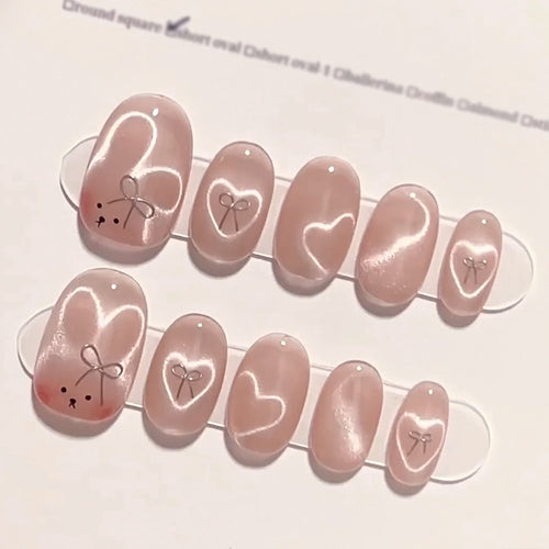 Künstliche Nagelverlängerungen mit niedlichem Hasen-Design und Herzen Karnz