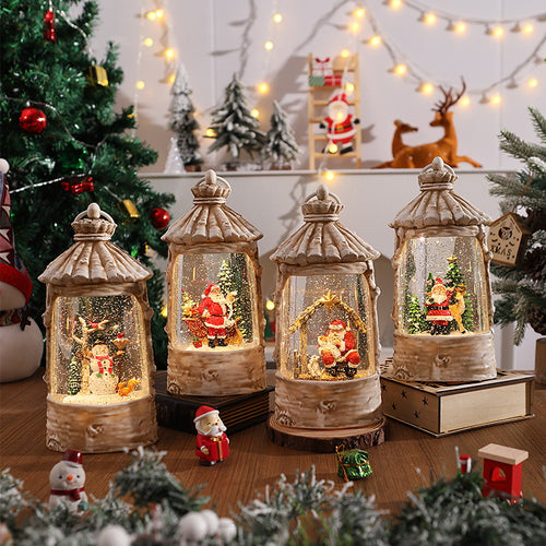 Beleuchtete Weihnachtslaterne mit Schneeszenen Karnz