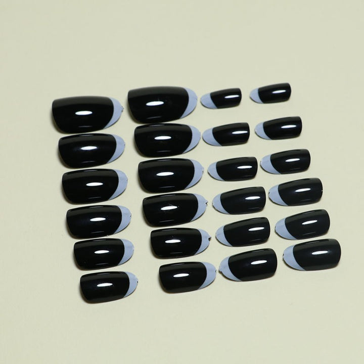 Elegante Stiletto French Tip Press-On Nägel Karnz