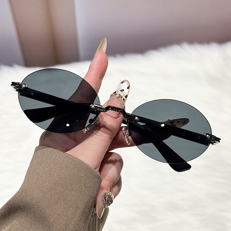 Damen modische und elegante Sonnenbrille mit ovalem Design Karnz
