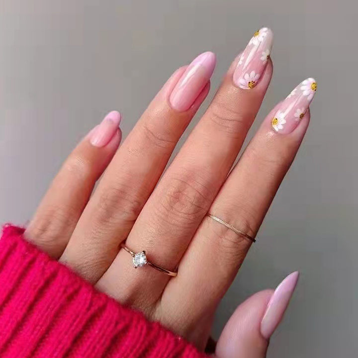 Kunstvolle Nagelverlängerungen mit floralem Design Karnz
