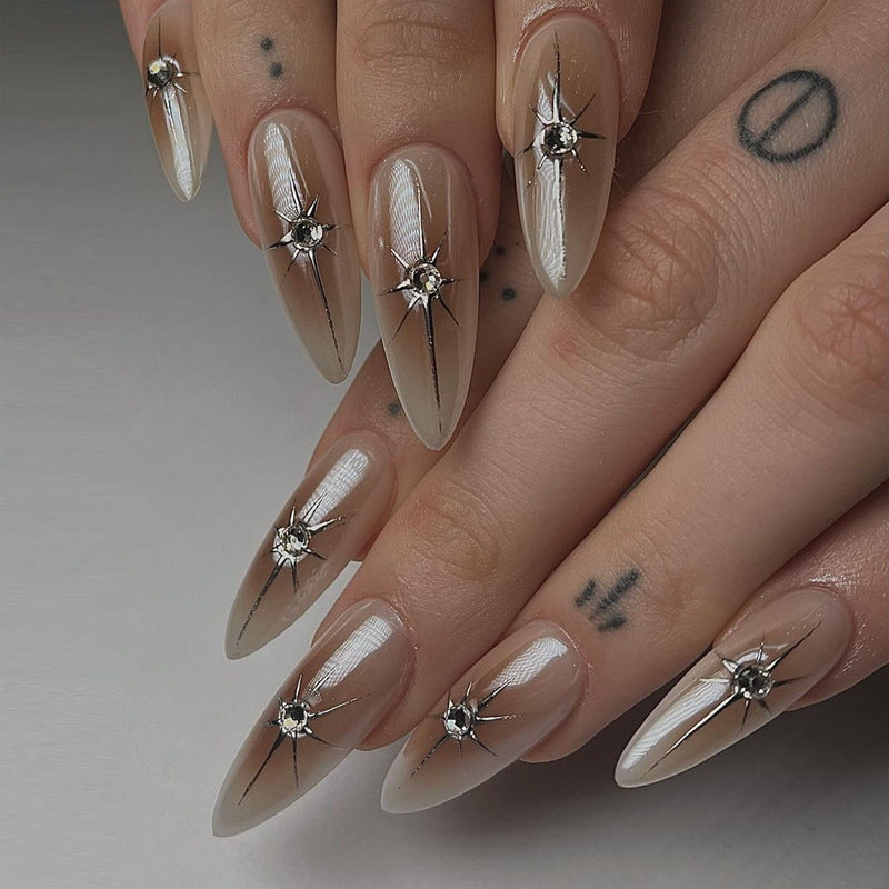 Elegante Stiletto Press-On Nagelkunst mit Strass-Akzenten Karnz