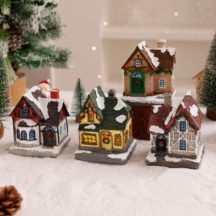 Dekoratives Weihnachtsdorf mit Lichtern Karnz