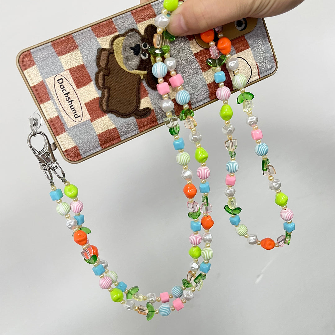 Perlen-Brillen-Kette mit stylischem Karomuster Karnz