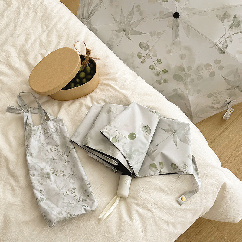 Damen Faltbarer Regenschirm mit elegantem botanischem Muster Karnz