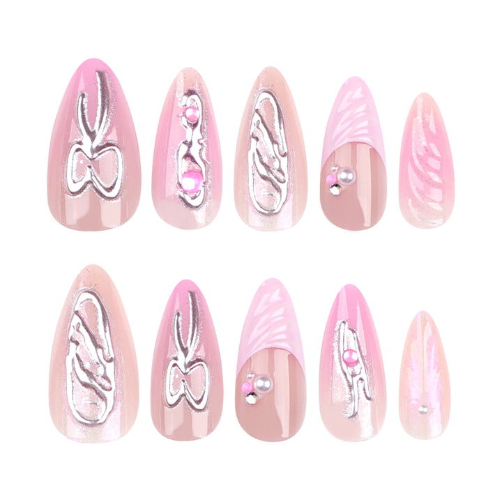 Kunstvolle Stiletto-Nägel mit Glitzer- und Perlverzierungen Karnz