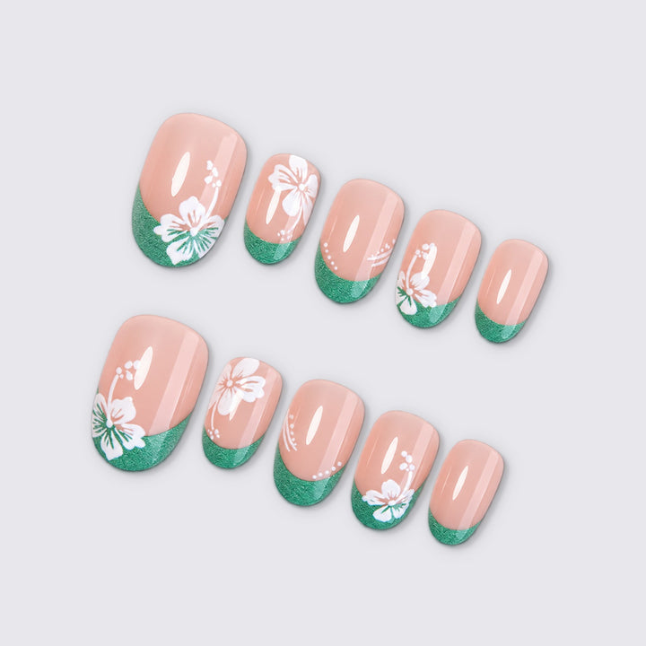 Kunstnagelset mit floralen Mustern und glitzernden Akzenten Karnz