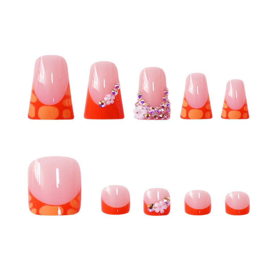 Dekoratives Press-On-Nagelset mit lebhaften Formen und Edelsteinen Karnz