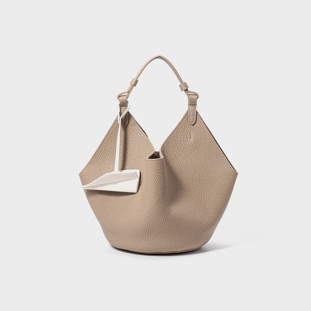 Schlaffes geprägtes Leder Hobo-Bucket-Tasche mit Oberarm und geometrischer Silhouette