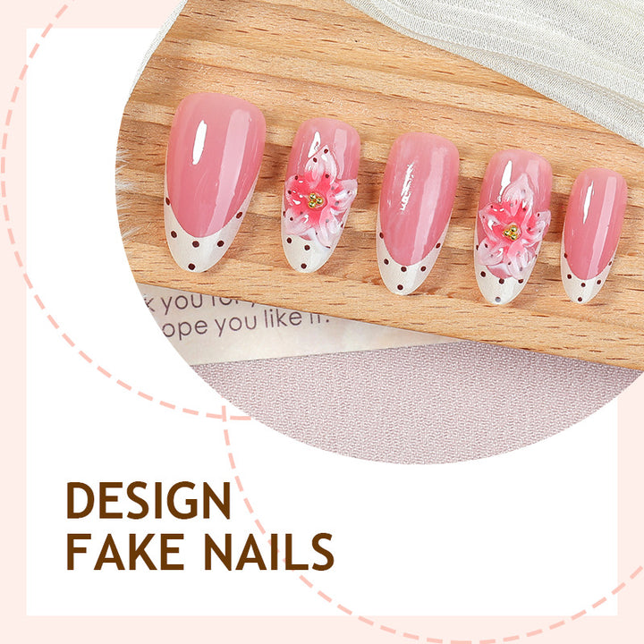 Kunstnagelset mit zartem Blumen- und Glitzermuster Karnz