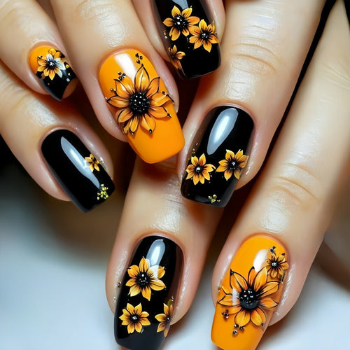 Kunstnägel im floralen Design mit Sonnenblumenmotiv Karnz