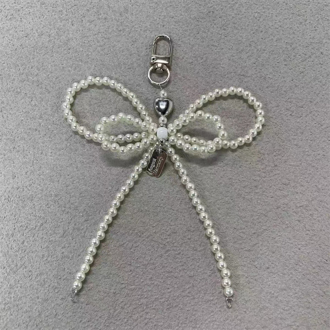 Elegante Perlenbogen Schlüsselanhänger Karnz