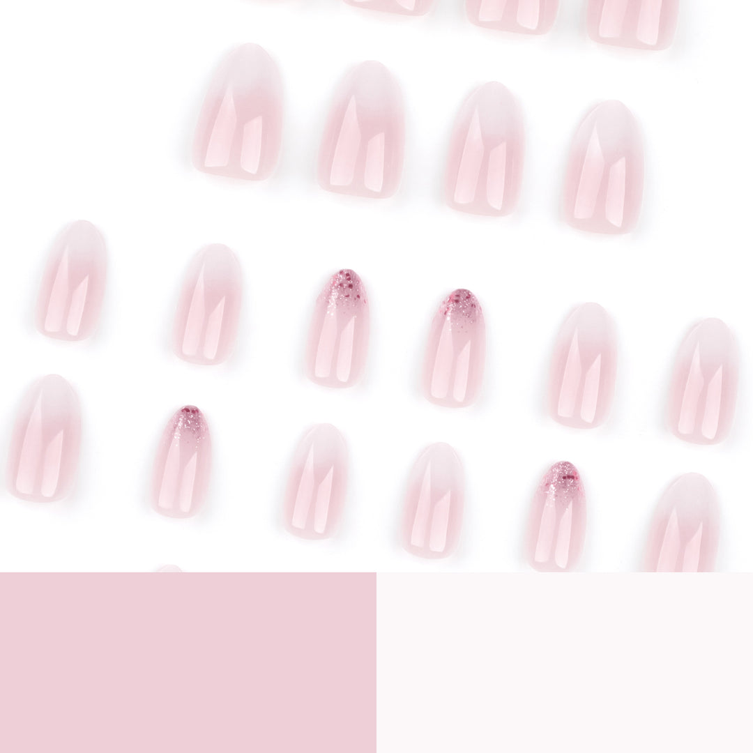 Kunstvolle Nagelverlängerungen mit Glitzerverzierung und Ombre-Effekt Karnz