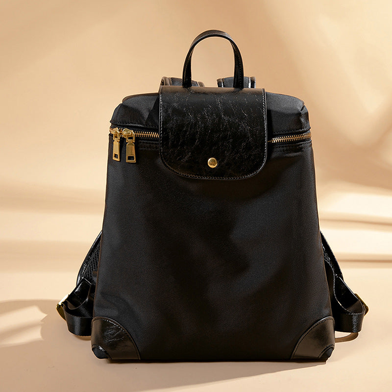 Vielseitiger Multi-Taschen-Rucksack mit Lederakzenten
