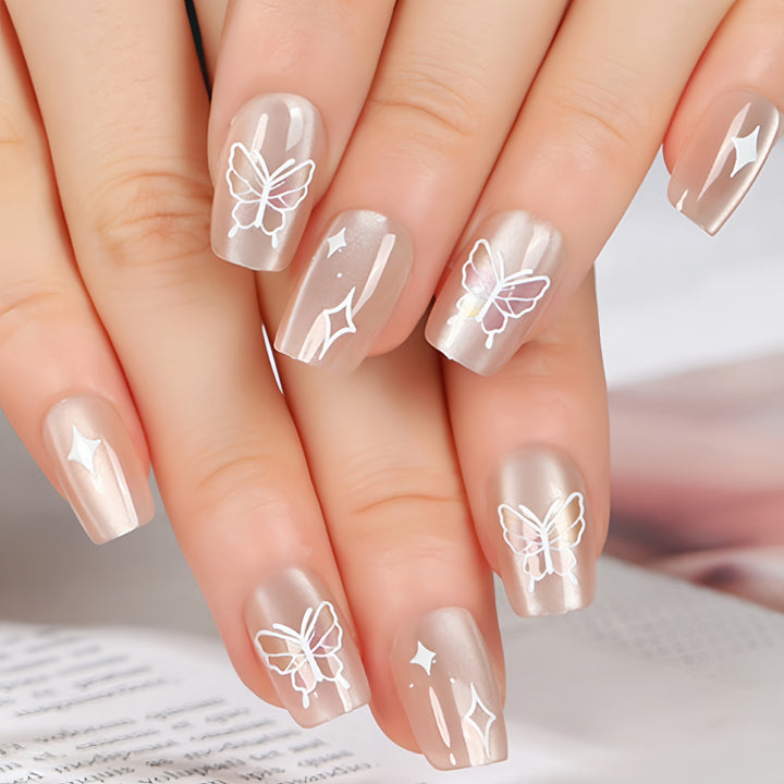 Kunstnägel mit floralem und glitzerndem Design Karnz