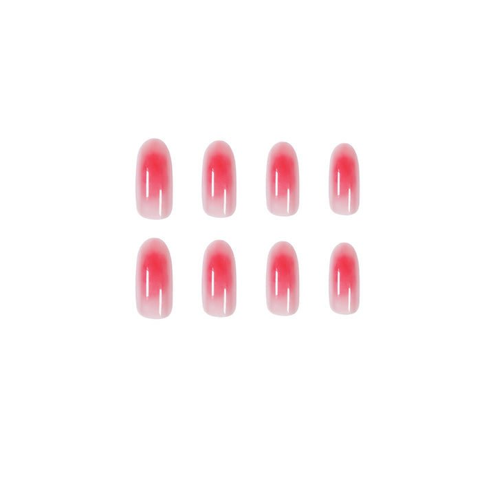 Kunstvolle Nagelverlängerungen im eleganten Ombre-Design Karnz