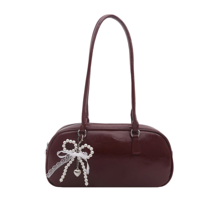 Leder Handtasche mit Patentoberfläche