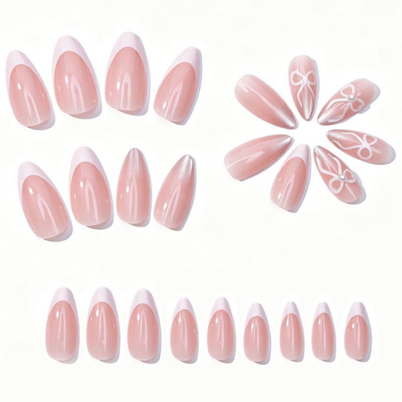 Elegante Press-On Nagelset mit Schleife und Glitzerakzenten
