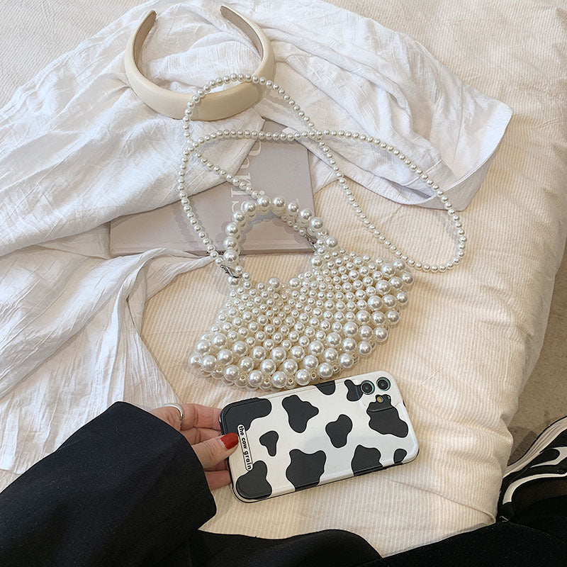 Elegante Handtasche mit Perlendetails