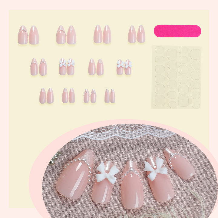 Dekoratives Press-On Nagelkunstset mit elegantem Bogen und Perlenakzenten Karnz