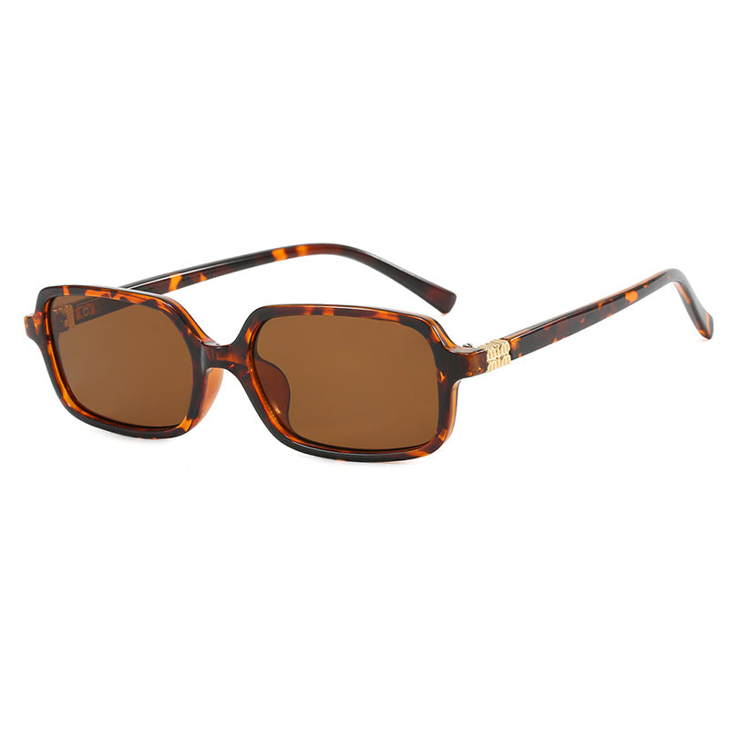 Damen modische Sonnenbrille mit elegantem Kunststoffrahmen und ausgefallenem Design Karnz