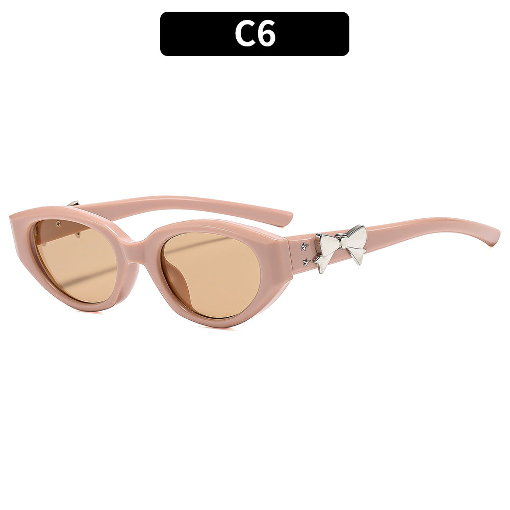 Elegante Katzenaugen-Sonnenbrille mit dekorativem Bogen