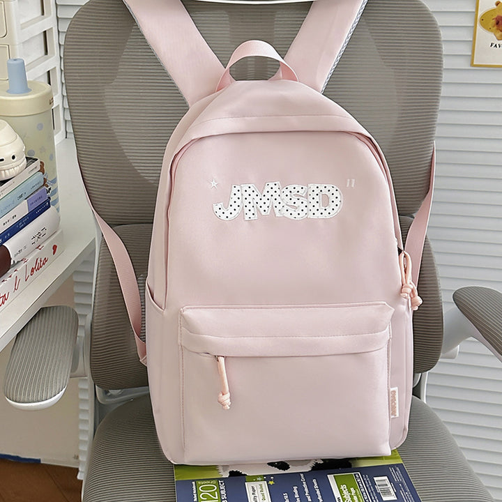 Trendy lässiger Tagesrucksack mit süßem Charakterakzent Karnz
