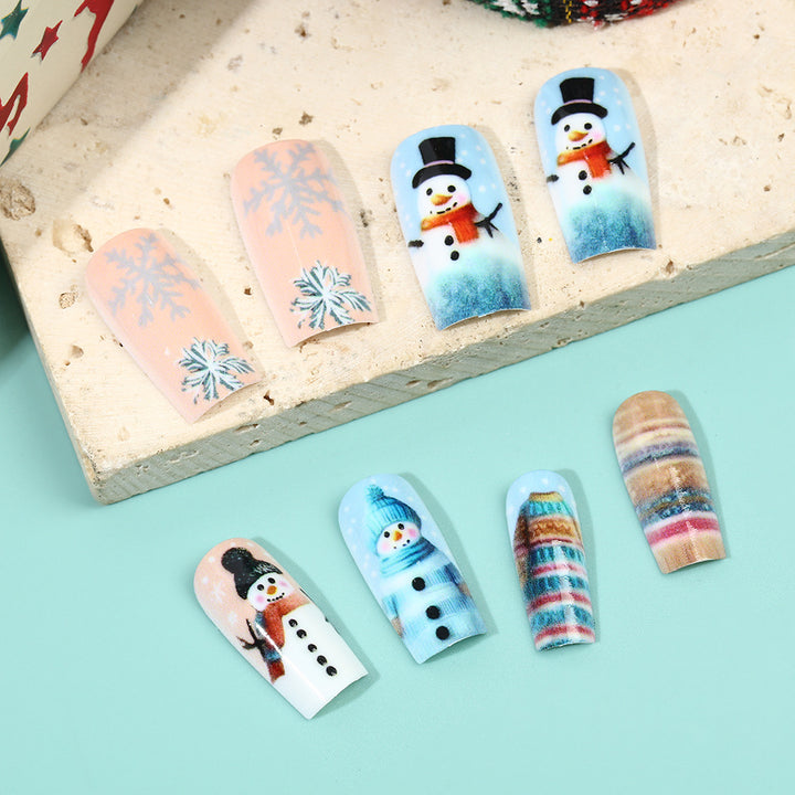 Festliche Kunstnägel mit Schneemann-Motiv Karnz