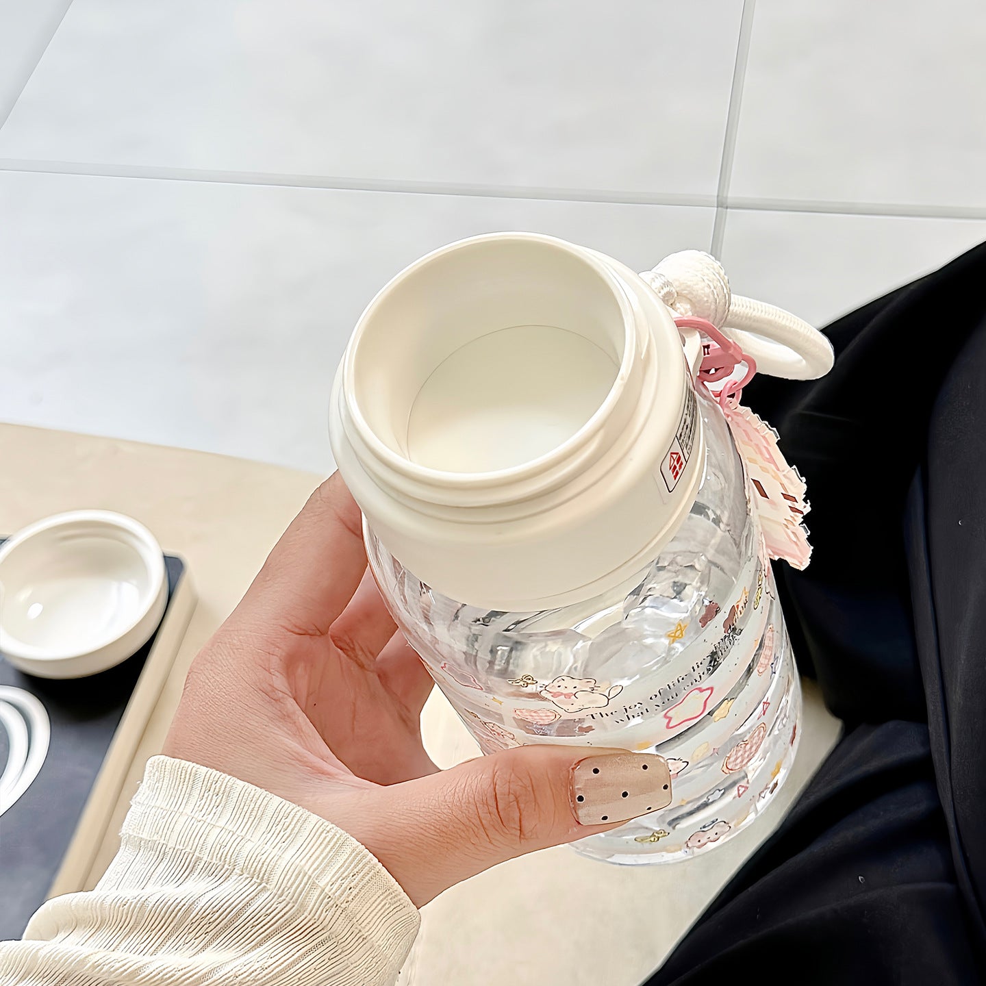 Damen vielseitige Trinkflasche mit integriertem Schlüsselanhänger Karnz