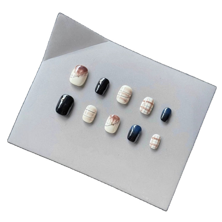 Künstlerisches Press-On Nagelset mit abstraktem Marmor Design