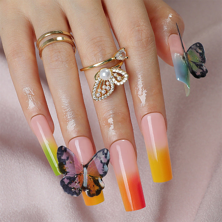 Künstlerisches Press-On Nagelset mit Schmetterlings- und Farbverlauf-Design Karnz
