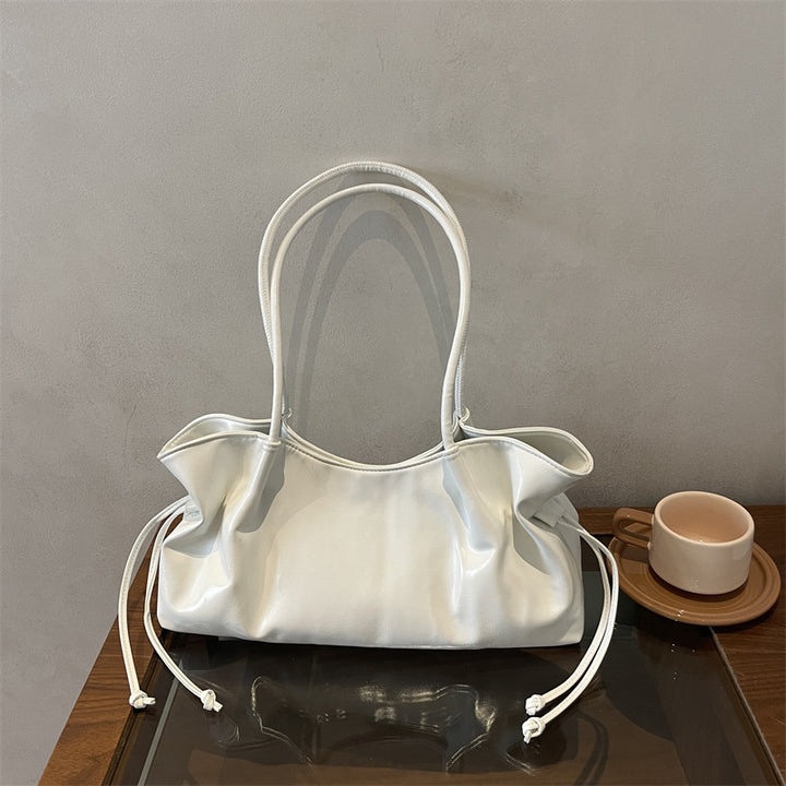 Glänzende Kunstleder-Handtasche