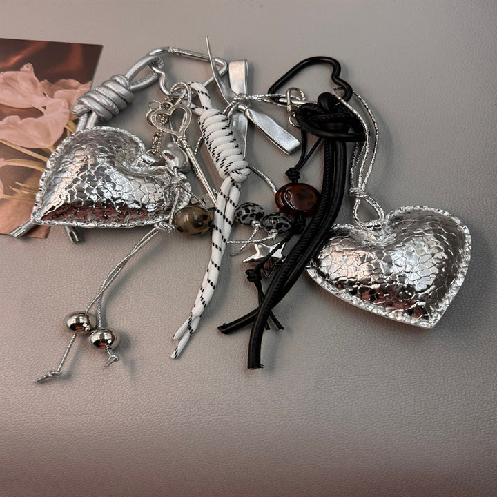 Herzförmiger Metall-Schlüsselanhänger Karnz
