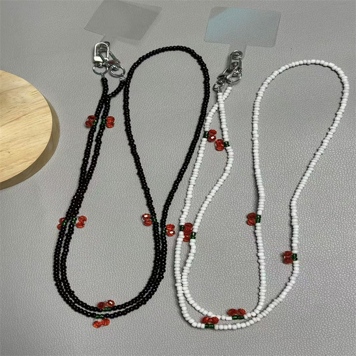 Perlen-Brillenband mit künstlerischen Charms Karnz