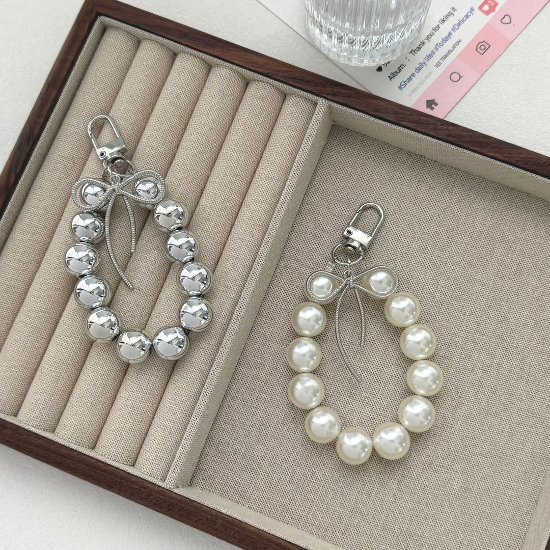 Eleganter Perlencharms-Schlüsselanhänger Karnz