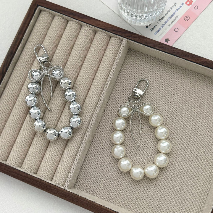 Eleganter Perlencharms-Schlüsselanhänger Karnz