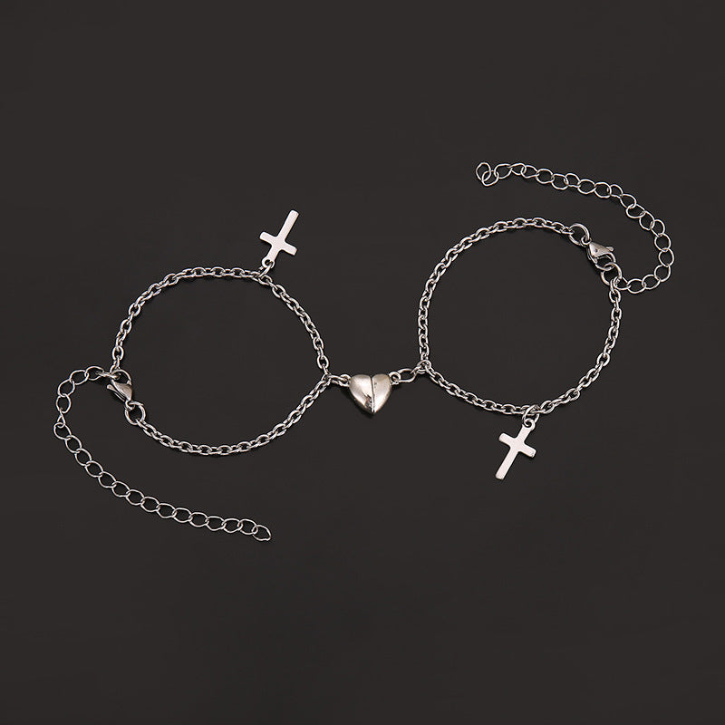 Versatile Armreif mit Kreuz- und Herzanhängern Karnz