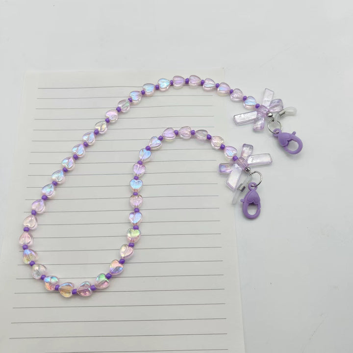 Modische Brillenhalterkette mit Herz- und Blütenmotiven Karnz