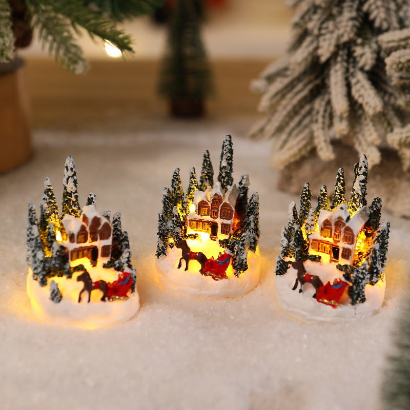 Beleuchtete Weihnachtsdorf-Szene Karnz