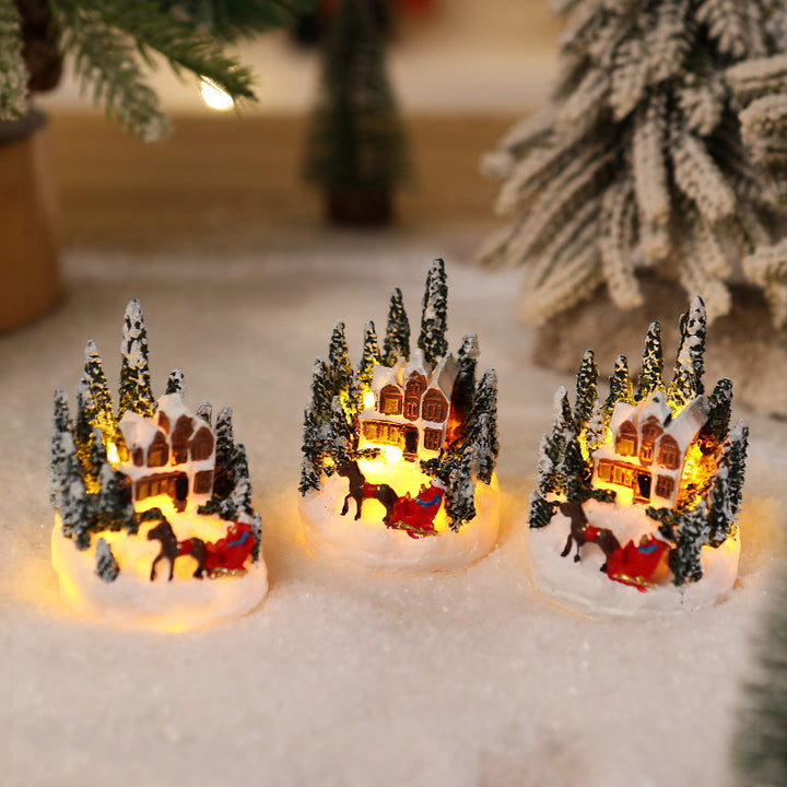 Beleuchtete Weihnachtsdorf-Szene Karnz