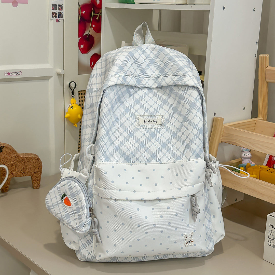Stylische Karomuster-Rucksack mit lustigen dekorativen Akzenten Karnz