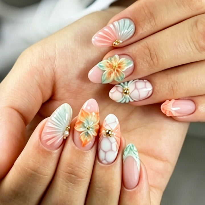 Kunstnagelset mit glamourösen Blumen- und Glitzerdetails Karnz