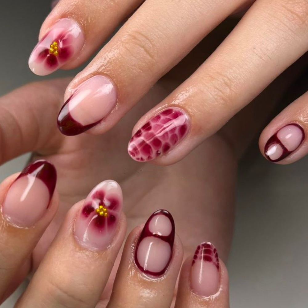 Künstlerische Blumennagelverlängerungen