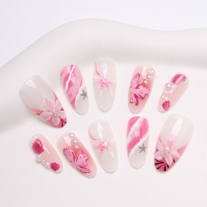 Kunstnagelset mit elegantem Blumen- und Glitzermuster Karnz