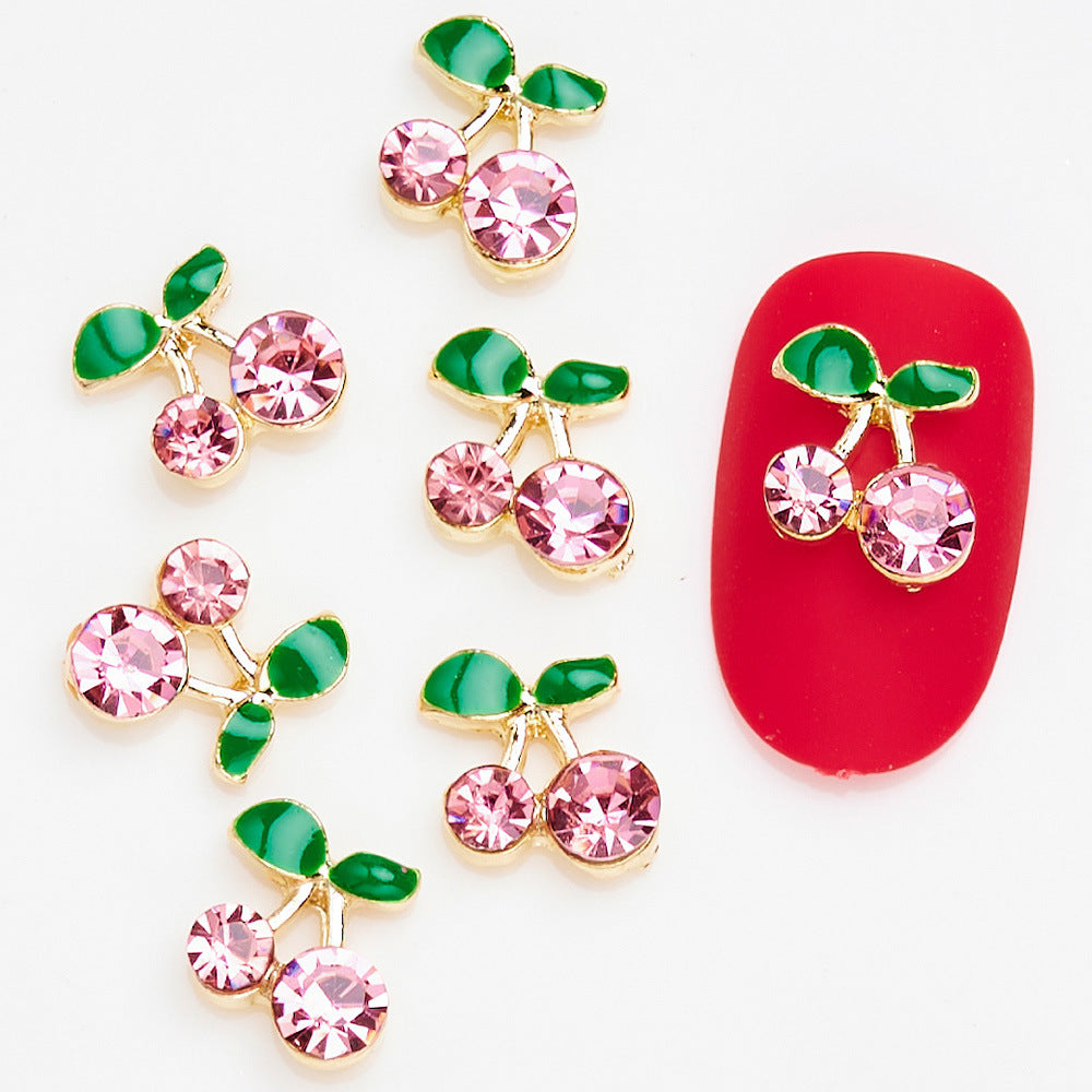 Dekorative Kirsch-Nagelkunst Charms
