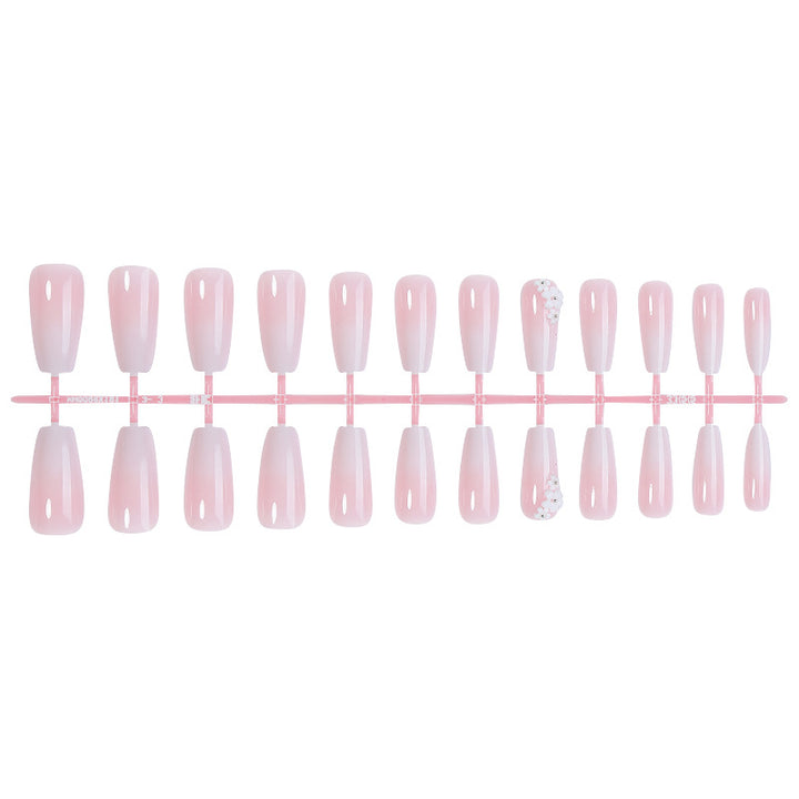 Elegantes Press-On-Nagelset mit floralen Akzenten Karnz