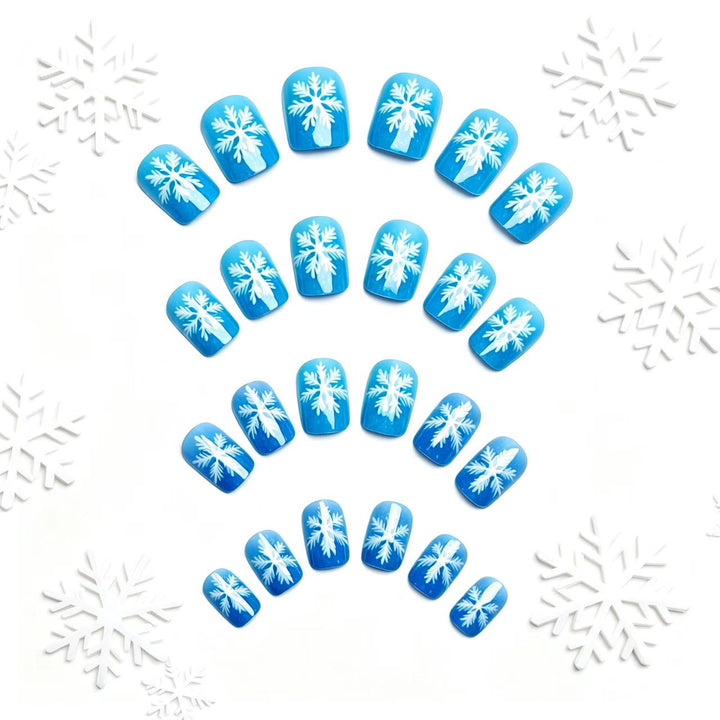 Kunstnägel mit Funkelndem Winterflocken-Design Karnz