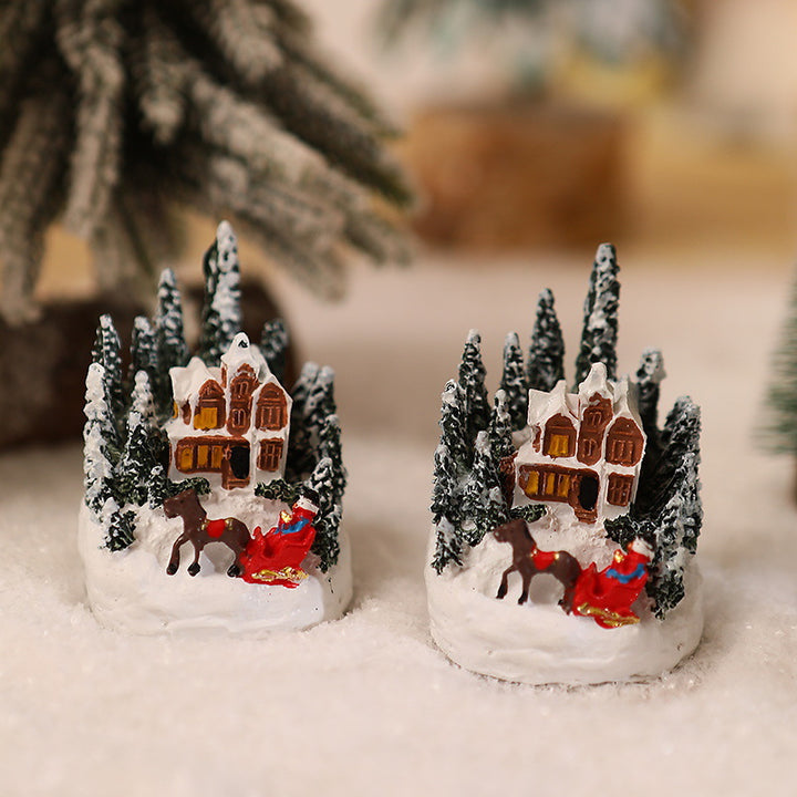 Beleuchtete Weihnachtsdorf-Szene Karnz