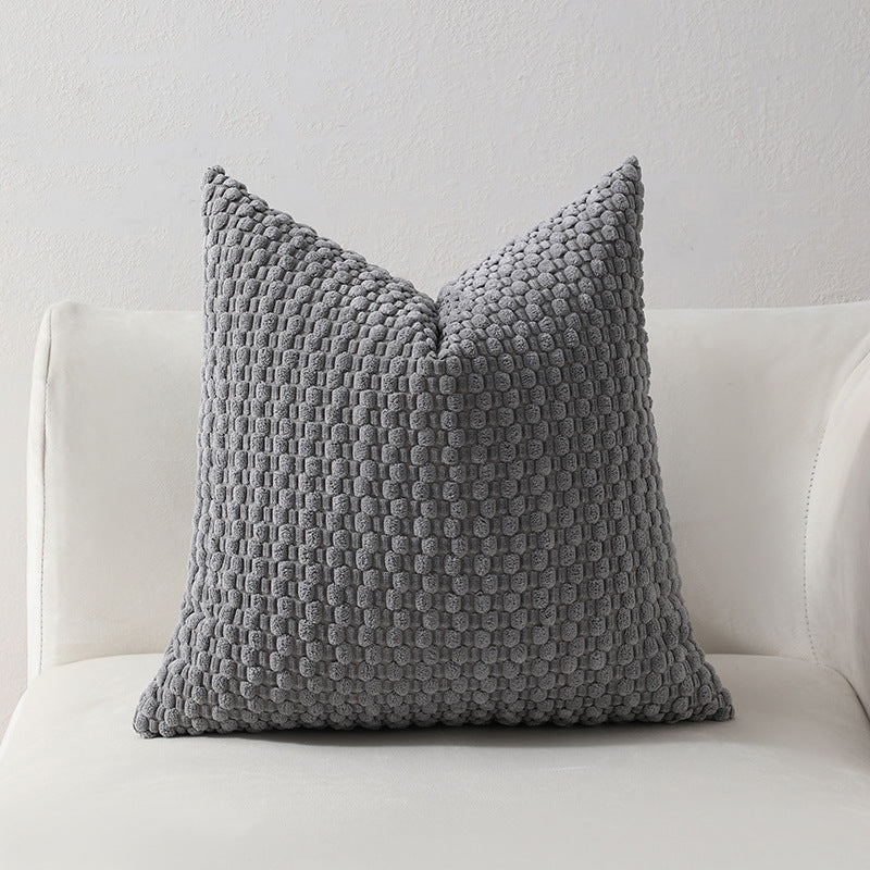 Strukturierter gestrickter Dekorationskissen